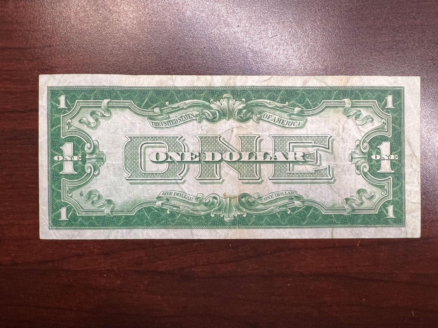 1928 $1 Silver Certificate – “Funny Back” – VF+ Good Color – No Tears/Pinholes – Sealed in Premium BCW Hard Display Case-7967