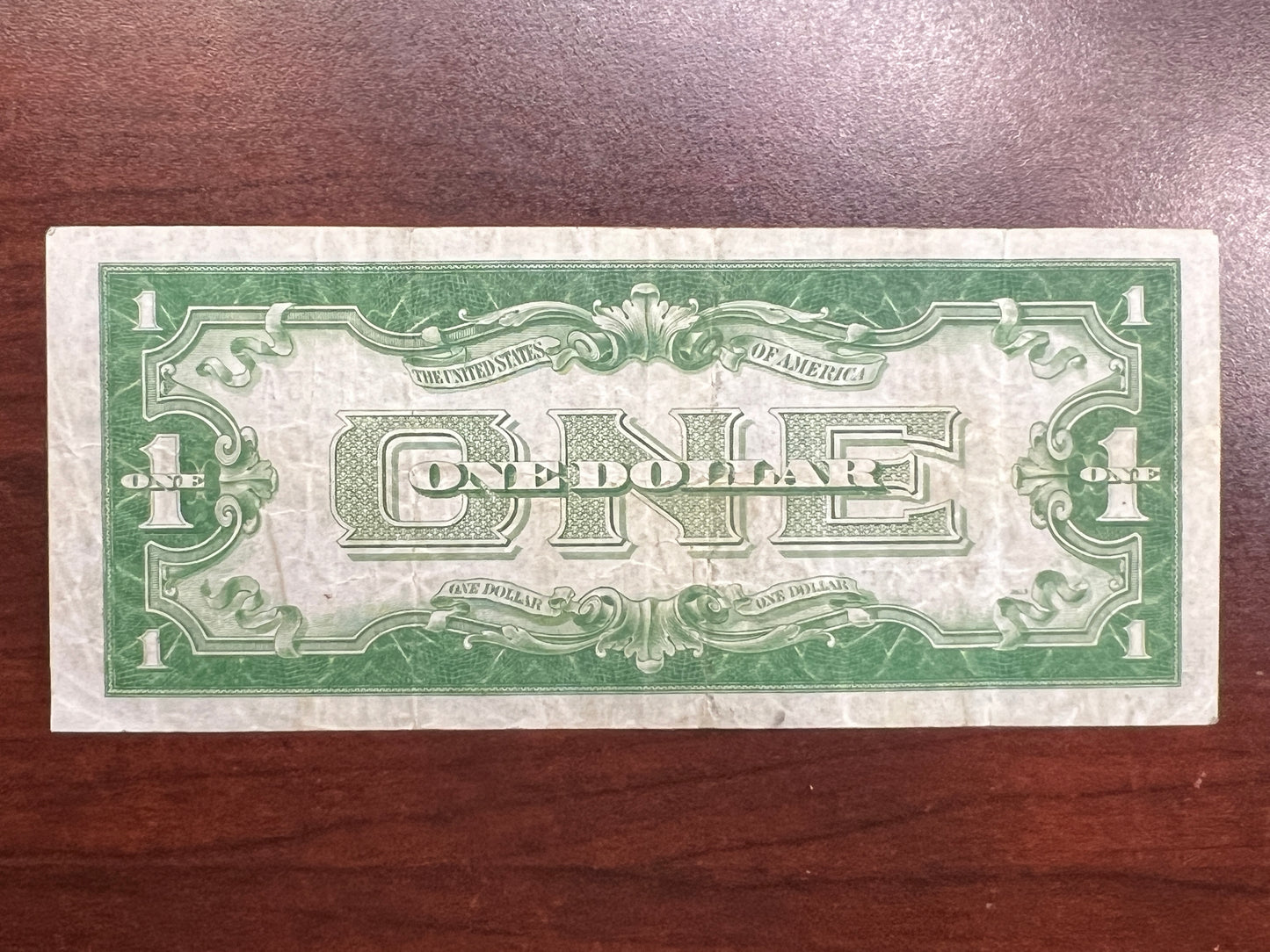 1934 $1 Silver Certificate – “Funny Back” – VF+ Good Color – No Tears/Pinholes – Sealed in Premium BCW Hard Display Case-2185A