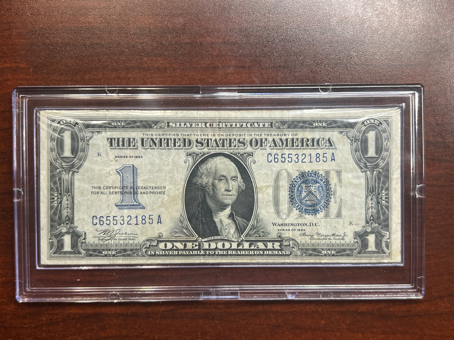 1934 $1 Silver Certificate – “Funny Back” – VF+ Good Color – No Tears/Pinholes – Sealed in Premium BCW Hard Display Case-2185A