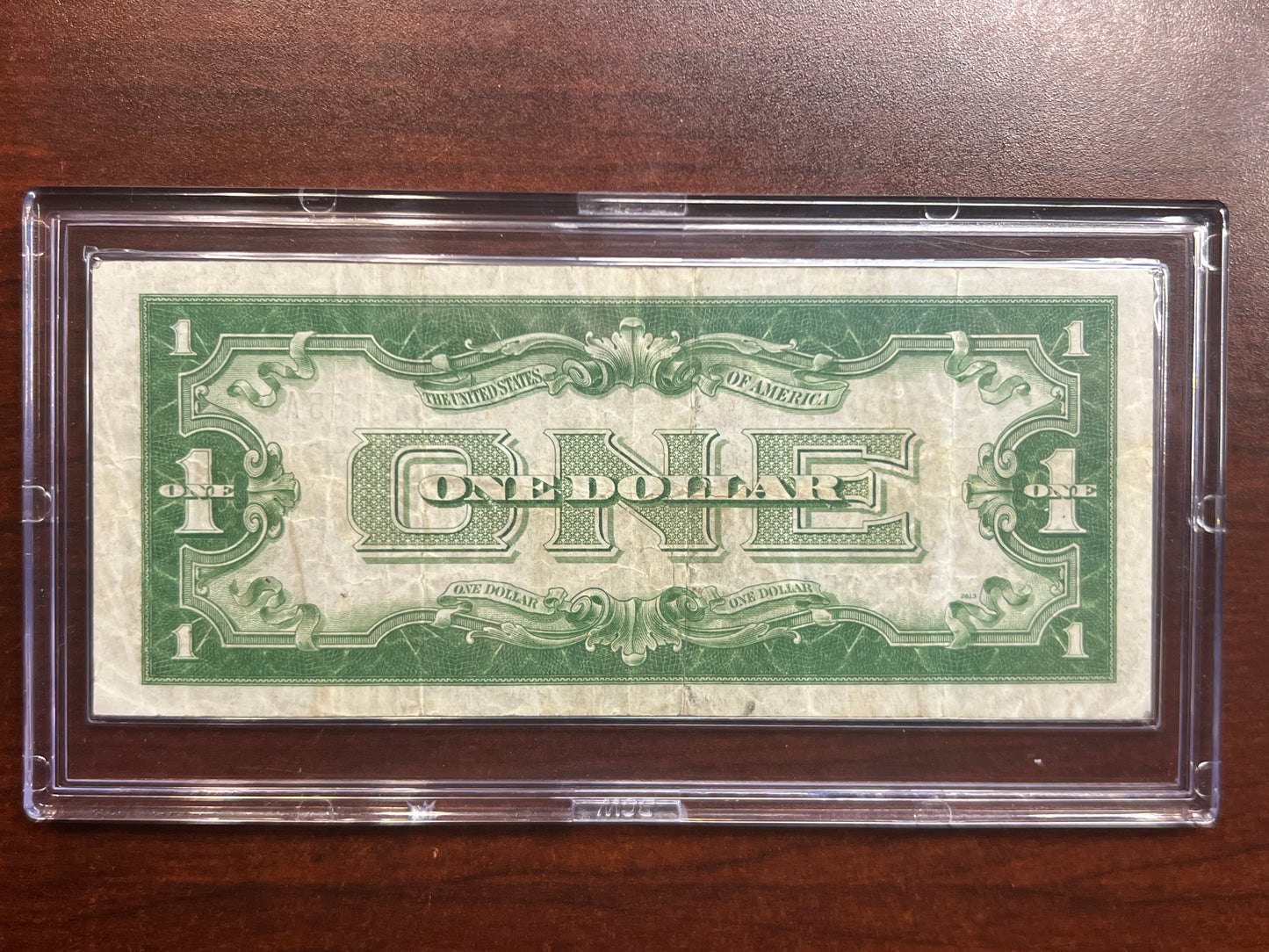 1934 $1 Silver Certificate – “Funny Back” – VF+ Good Color – No Tears/Pinholes – Sealed in Premium BCW Hard Display Case-2185A