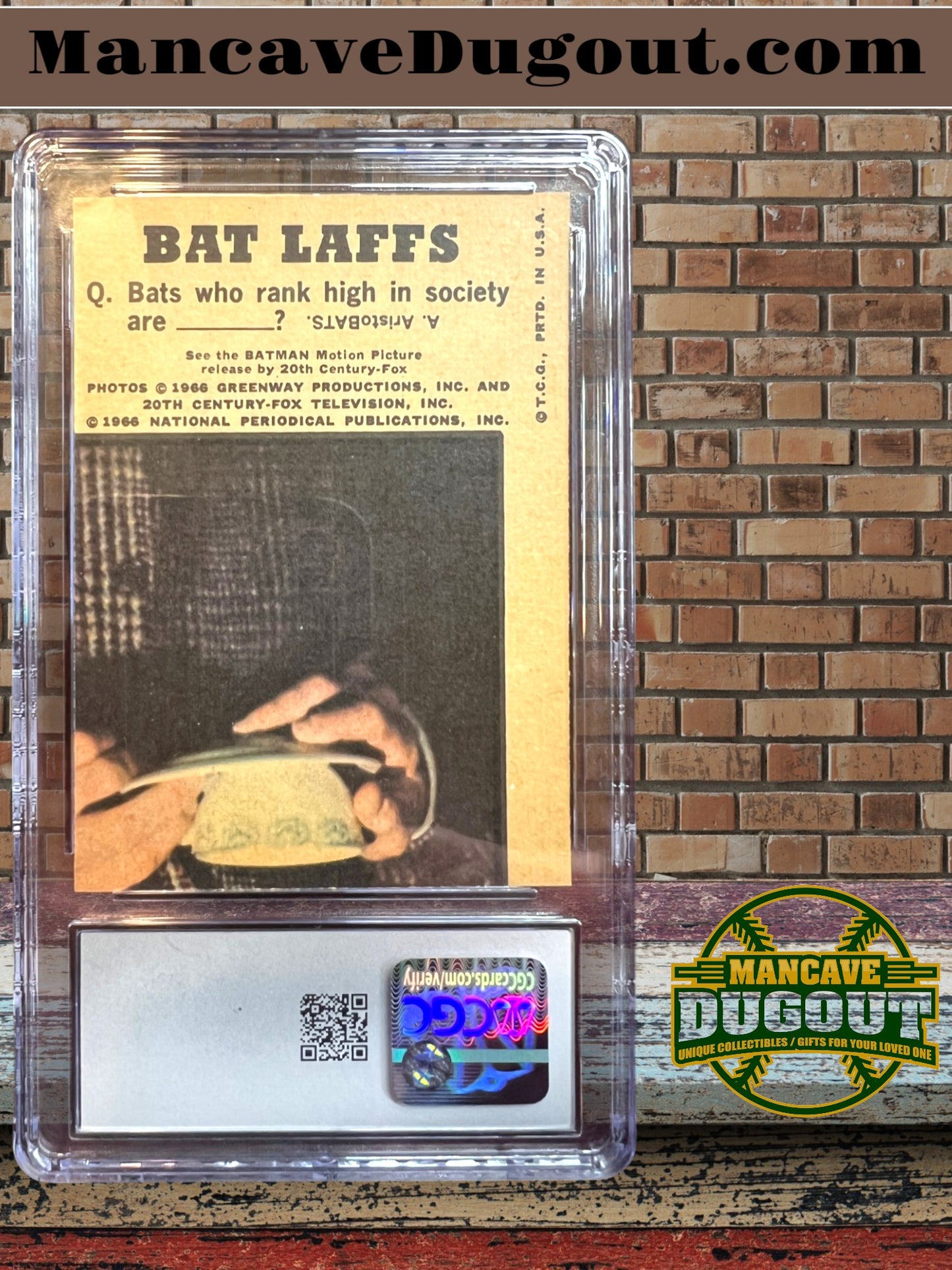 1966 Topps Batlaffs #25 – Batman & Robin & Batmobile - CGC 6