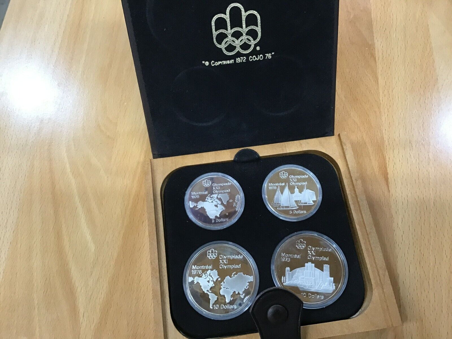 1976 - Canada 4 pc Olympic Coins, Series 1, Gem Cameo Proof w/Wooden Case.